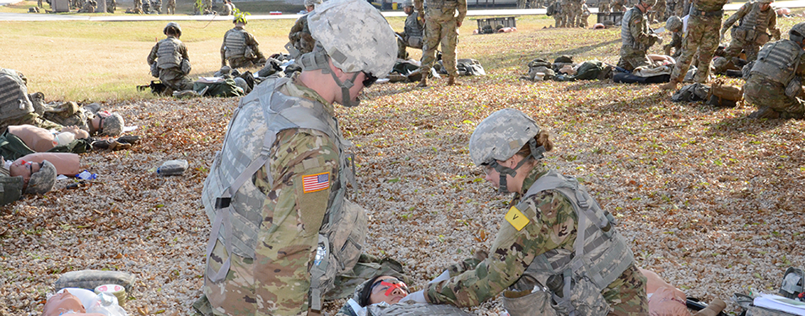 Combat Medic Specialist administering aid